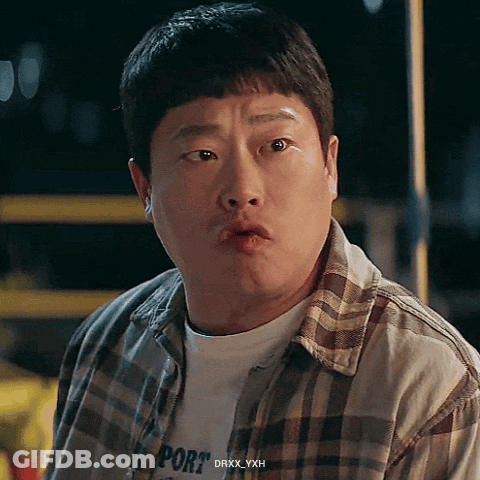 Man In Plaid Shirt With Port Making Funny Face GIF