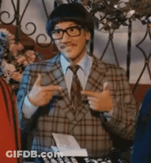 Man In Plaid Suit Giving Thumbs Up GIF