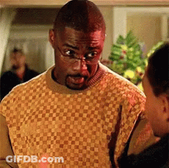Man In Plaid Sweater And Glasses Talking To Another GIF