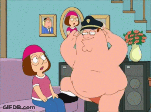 Man In Police Hat Next To Woman On Couch GIF
