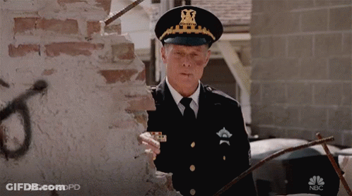 Man In Police Uniform At Brick Wall #Chicagopd GIF