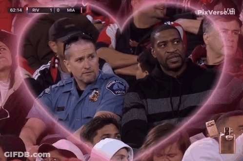 Man In Police Uniform At Sports Game GIF