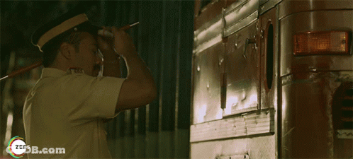 Man In Police Uniform By Vehicle With Www.Zees.Com GIF