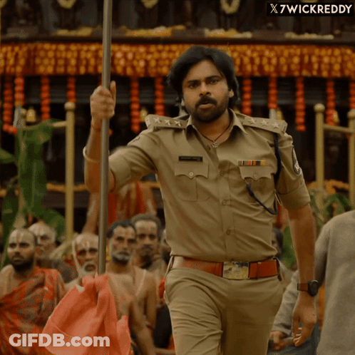 Man In Police Uniform Holding Pole In Crowd X7wickreddy GIF