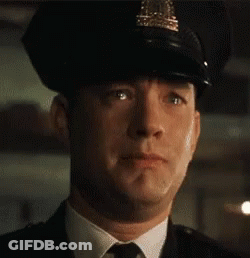 Man In Police Uniform Making Funny Face GIF