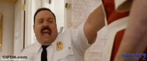 Man In Police Uniform With Arms Outstretched GIF