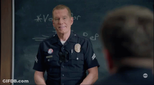 Man In Police Uniform With Los Angeles Police Department Badge GIF