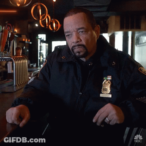 Man In Police Uniform With New York Badge GIF