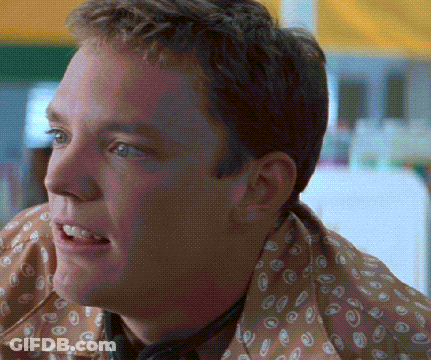 Man In Polka Dot Shirt And Headphones GIF