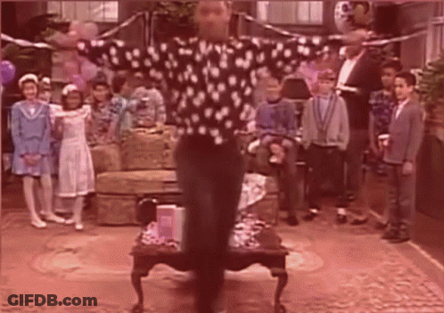 Man In Polka Dot Shirt Dancing Before Crowd GIF
