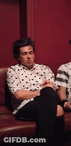 Man In Polka Dot Shirt Eyes Closed GIF