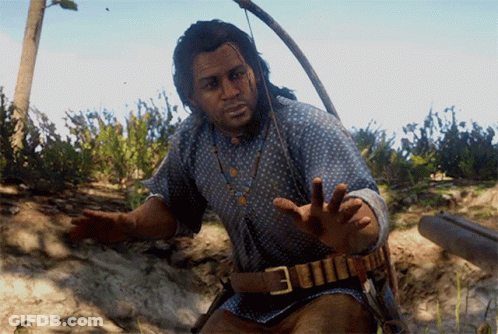 Man In Polka Dot Shirt Kneeling With Hands Outstretched GIF