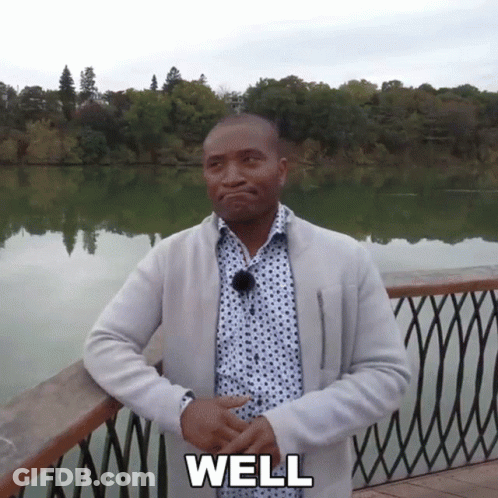 Man In Polka Dot Shirt Saying Well GIF