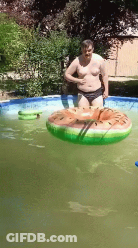 Man In Pool With Watermelon Float GIF