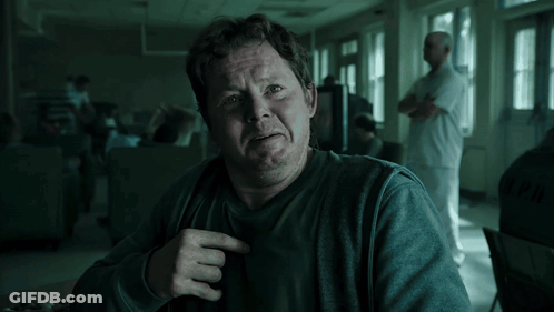 Man In Prison Cell With NPN Shirt GIF