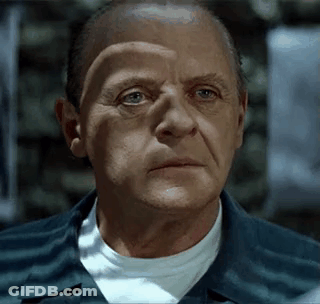 Man In Prison Uniform Close Up GIF