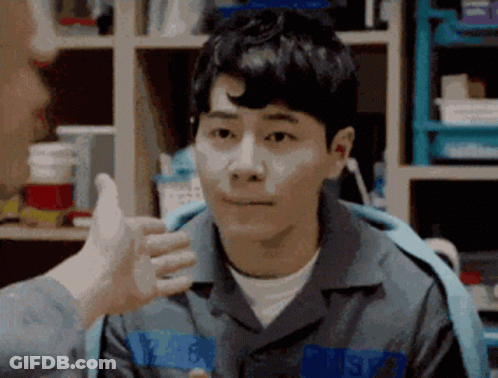 Man In Prison Uniform Giving Thumbs Up GIF