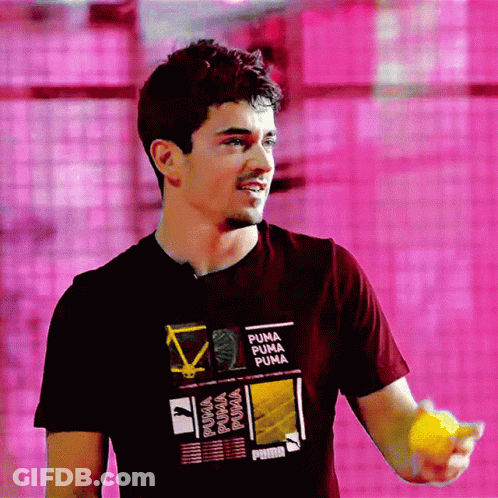 Man In Puma T-Shirt Holding Yellow Ball GIF