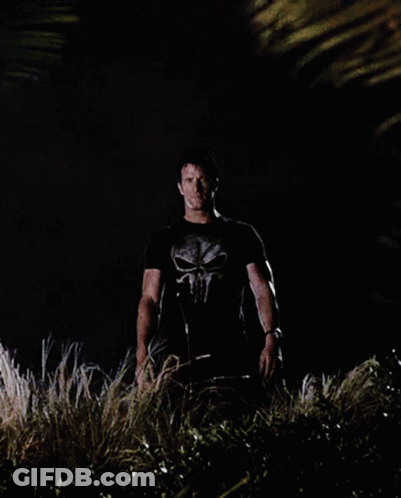 Man In Punisher T-Shirt In Darkness GIF