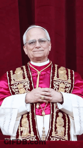 Man In Purple And Gold Robe Arms Crossed GIF