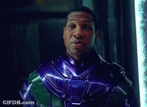 Man In Purple And Green Costume Says Shut Up GIF