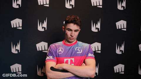 Man In Purple And Pink Shirt With Letter T GIF