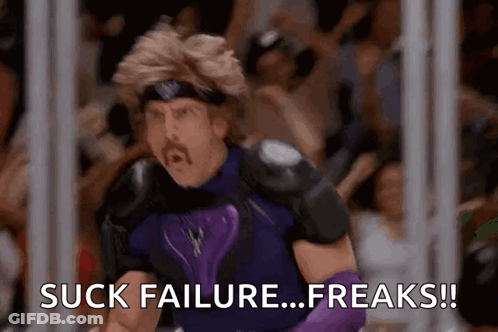 Man In Purple Costume Saying Suck Failure Freaks GIF
