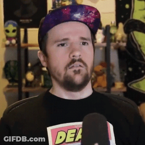 Man In Purple Hat And Black Shirt Saying Dead GIF