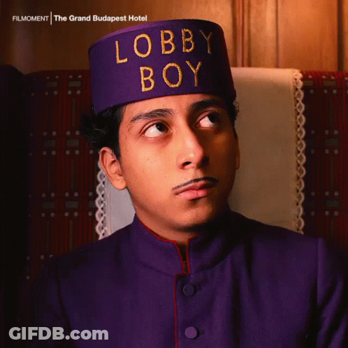 Man In Purple Hat Saying Lobby Boy GIF