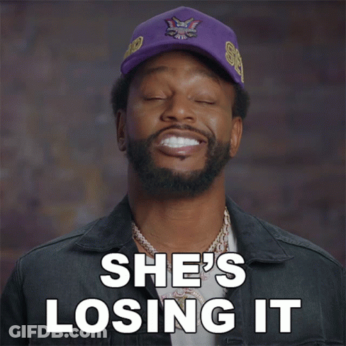 Man In Purple Hat Saying She's Losing It GIF