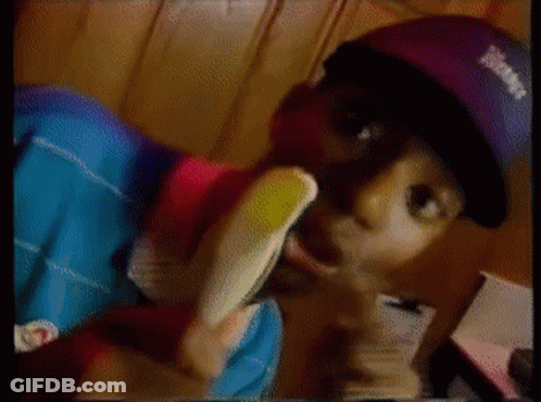 Man In Purple Hat With Eamf Eating Banana GIF