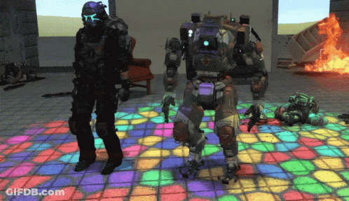 Man In Purple Helmet Next To Robot With TCT GIF
