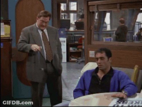 Man In Purple Jacket At Workers Sign GIF