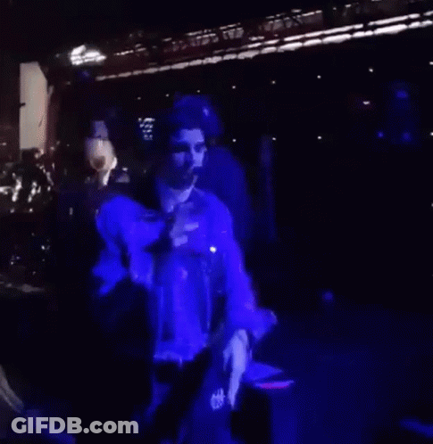 Man In Purple Jacket Dancing GIF