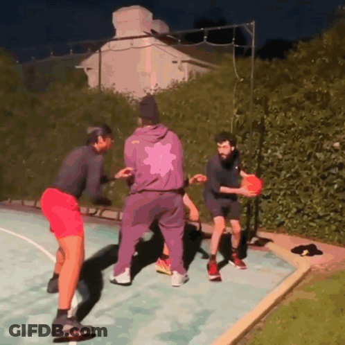 Man In Purple Jacket Playing Basketball GIF