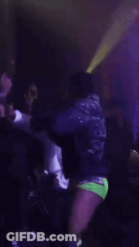 Man In Purple Jacket With Word Ricky GIF