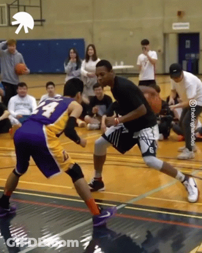 Man In Purple Jersey Dribbling Basketball GIF