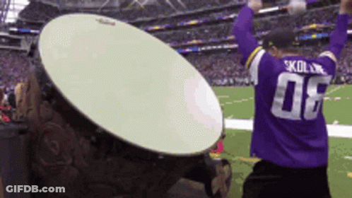 Man In Purple Jersey Number 08 On Football Field GIF