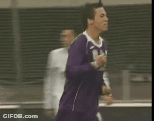 Man In Purple Jersey Running GIF