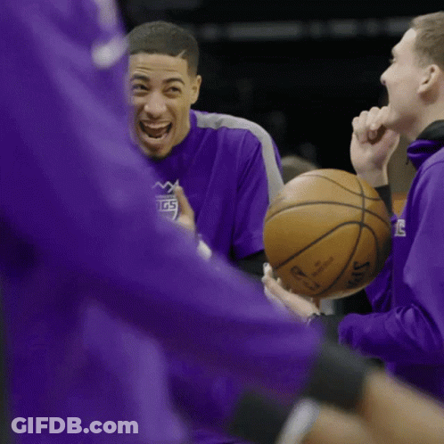Man In Purple Kings Shirt Holding Basketball GIF