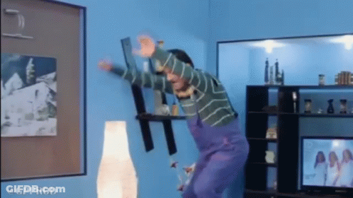 Man In Purple Overalls Jumping Gpprod GIF
