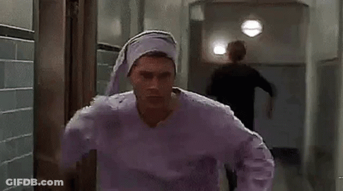 Man In Purple Pajama Top And Purple Hat GIF