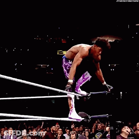 Man In Purple Pants Kicking Opponent GIF