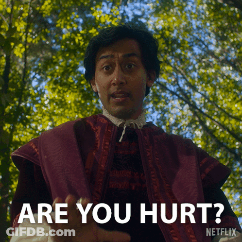 Man In Purple Robe Saying Are You Hurt GIF