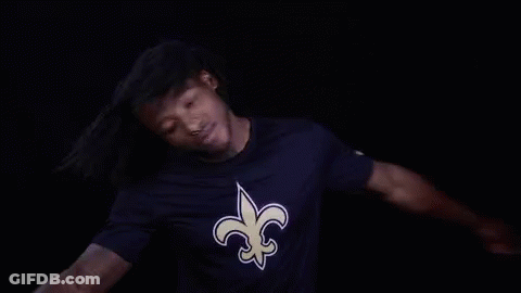 Man In Purple Saints T-Shirt Dancing GIF