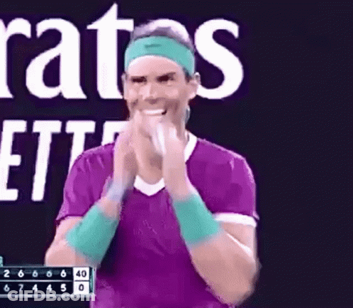 Man In Purple Shirt And Green Headband Clapping GIF