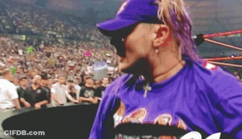 Man In Purple Shirt And Purple Hat GIF