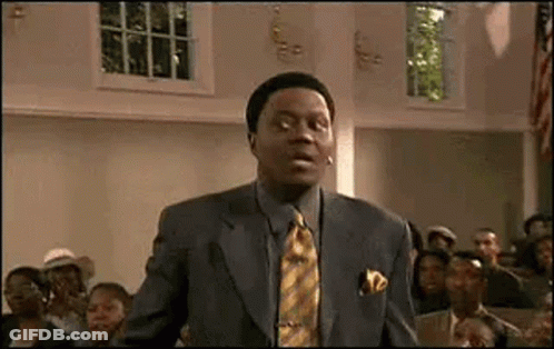Man In Purple Shirt And Vest Sitting In Chair Movieclips.com GIF