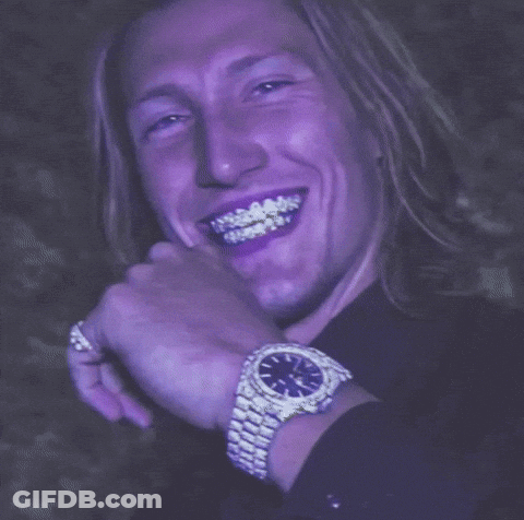 Man In Purple Shirt And White Watch Smiling GIF