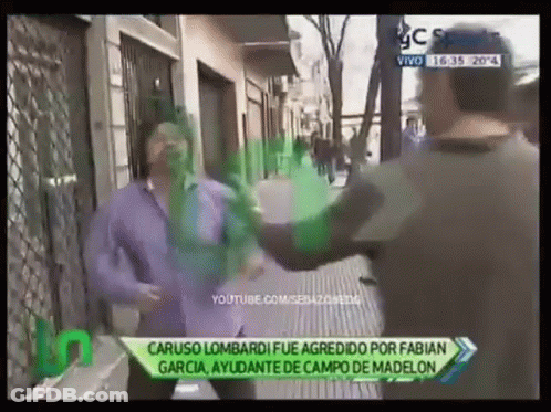 Man In Purple Shirt Being Attacked GIF